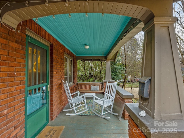 deck with covered porch