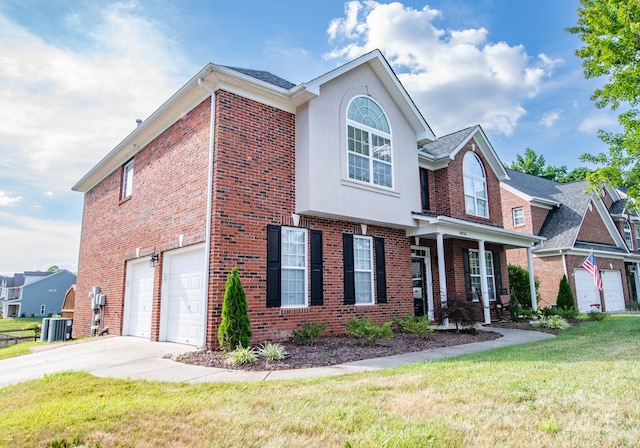 traditional home with driveway, brick siding, central AC, and a front yard