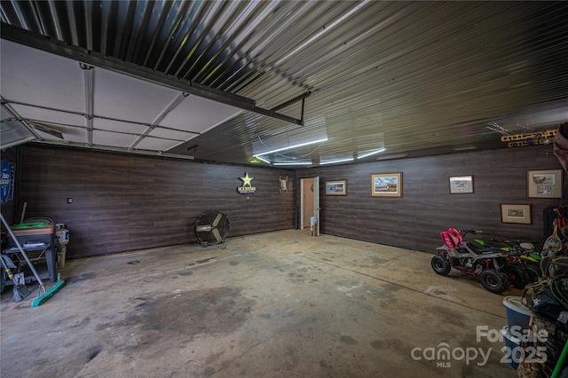 garage featuring metal wall