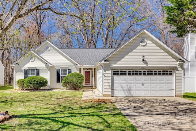 11000 White Stag Dr, Charlotte, NC 28269 - view of front of property featuring concrete driveway, a garage, a front yard, and roof with shingles