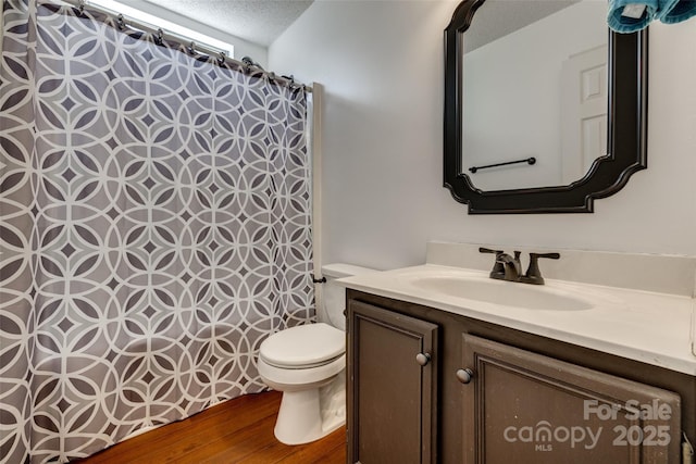 11000 White Stag Dr, Charlotte, NC 28269 - bathroom featuring vanity, a shower with curtain, and wood finished floors