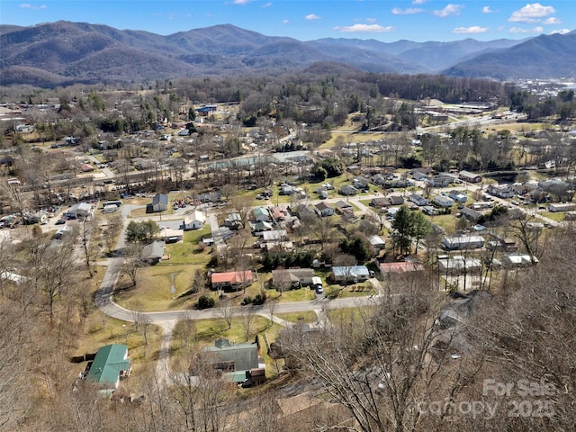 drone / aerial view featuring a mountain view