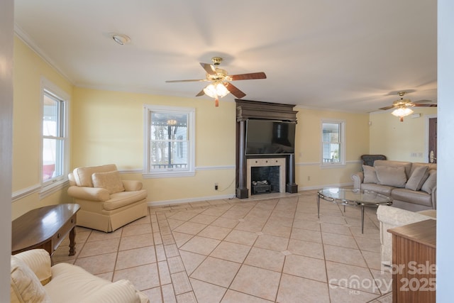 living room featuring light tile patterned floors, a wealth of natural light, and crown molding