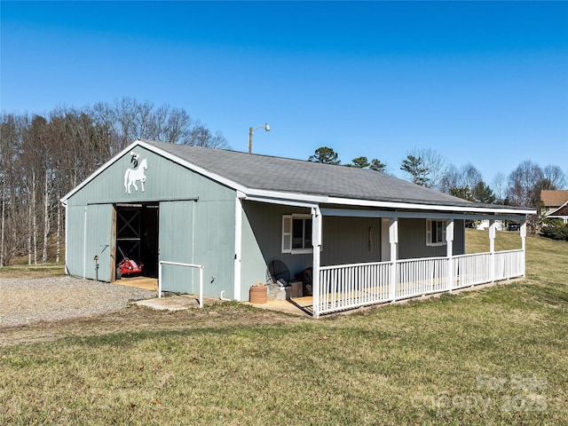 exterior space with a lawn and covered porch