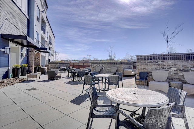 view of patio / terrace with outdoor dining space and outdoor lounge area