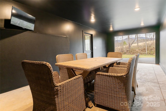 dining space with recessed lighting