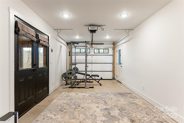 garage with french doors and baseboards