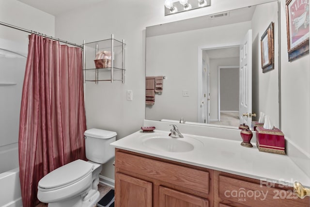 full bath with visible vents, toilet, vanity, and shower / bath combination with curtain