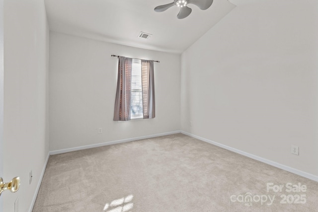 unfurnished room featuring visible vents, baseboards, a ceiling fan, and carpet flooring