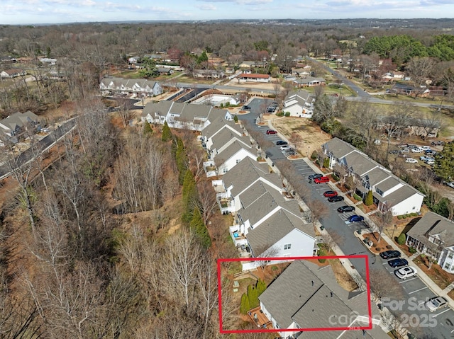 birds eye view of property with a residential view