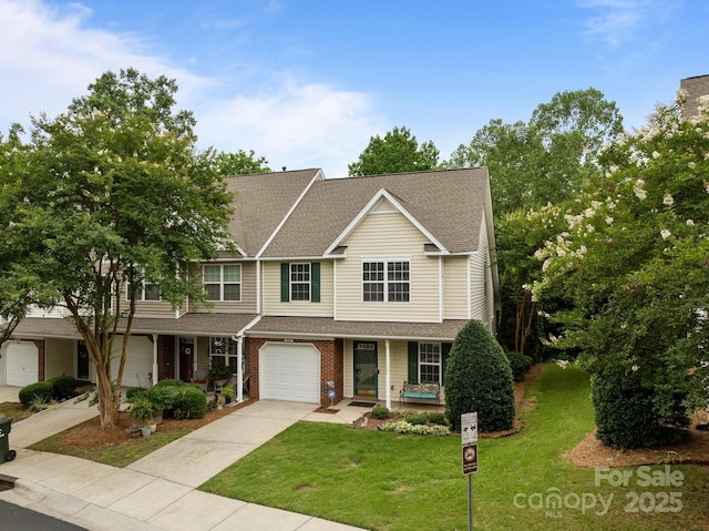 2592 Brackley Pl NW, Concord, NC 28027 - multi unit property with a front yard, concrete driveway, a garage, a porch, and roof with shingles
