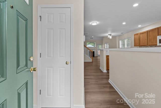2592 Brackley Pl NW, Concord, NC 28027 - corridor with dark wood-style flooring, recessed lighting, baseboards, and stairway