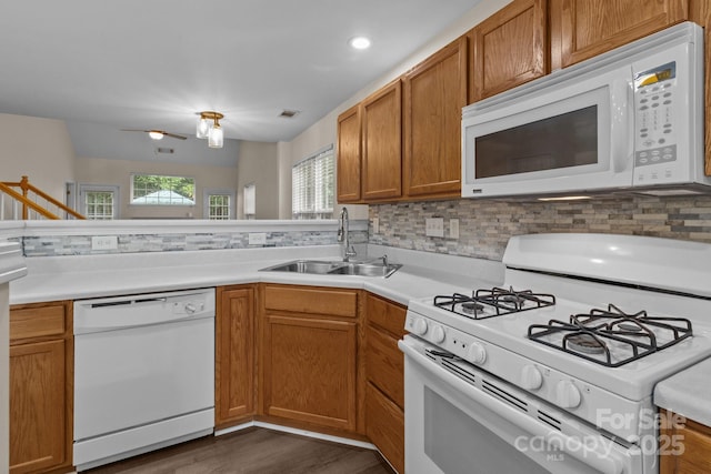2592 Brackley Pl NW, Concord, NC 28027 - kitchen featuring white appliances, a sink, light countertops, tasteful backsplash, and dark wood-style floors