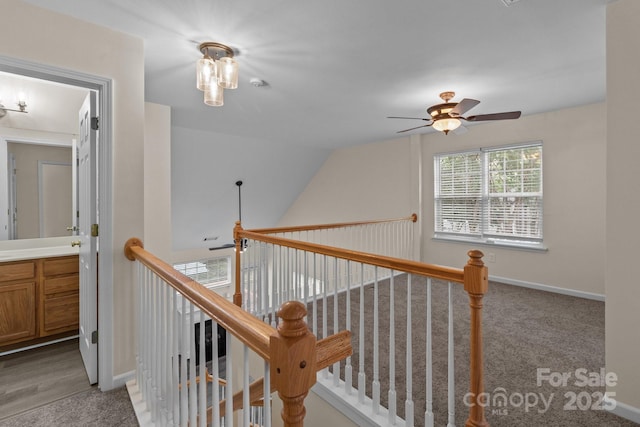 2592 Brackley Pl NW, Concord, NC 28027 - staircase with ceiling fan, baseboards, carpet, and vaulted ceiling