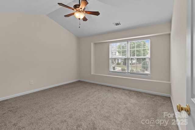 2592 Brackley Pl NW, Concord, NC 28027 - carpeted spare room featuring lofted ceiling, ceiling fan, and baseboards
