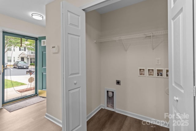 2592 Brackley Pl NW, Concord, NC 28027 - laundry room featuring hookup for a washing machine, hookup for an electric dryer, wood finished floors, and baseboards