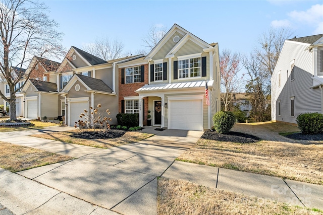 view of front facade featuring concrete driveway and brick siding