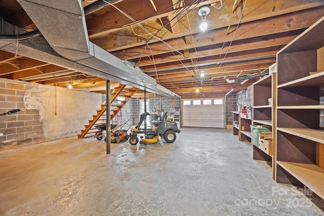 garage featuring concrete block wall