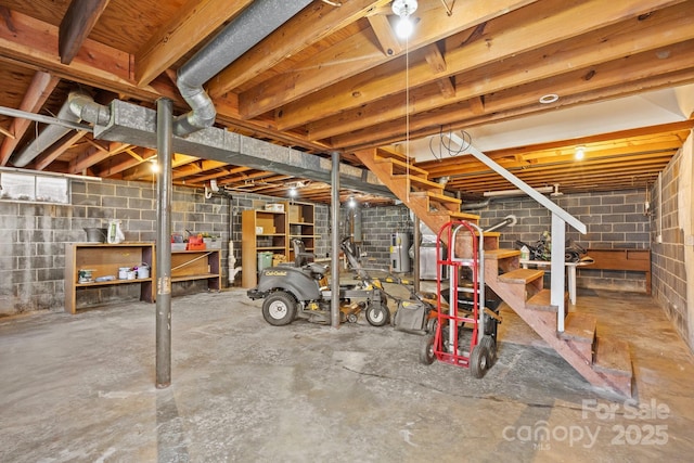 unfinished basement featuring stairway