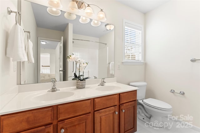 full bathroom featuring walk in shower, a sink, toilet, and double vanity