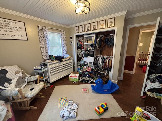 interior space featuring dark wood-style floors, baseboards, and crown molding