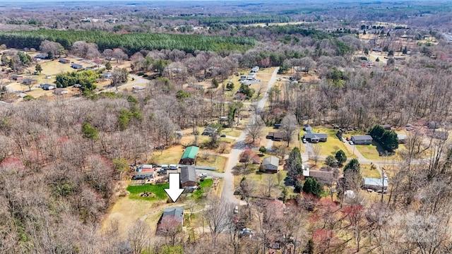 bird's eye view featuring a view of trees