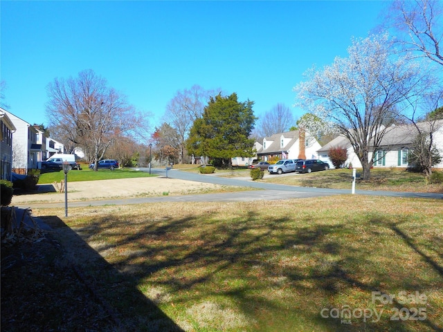 view of yard featuring a residential view