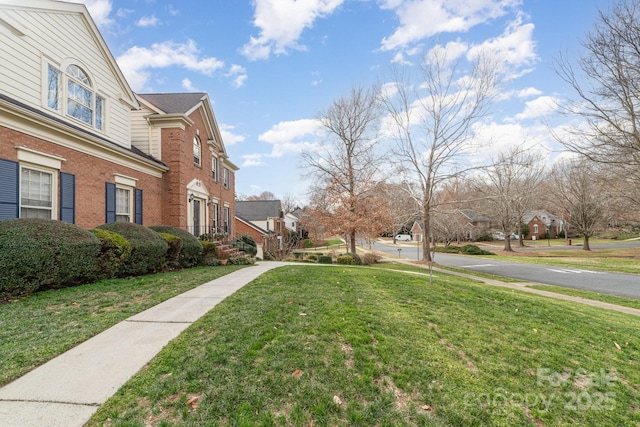 view of yard with a residential view