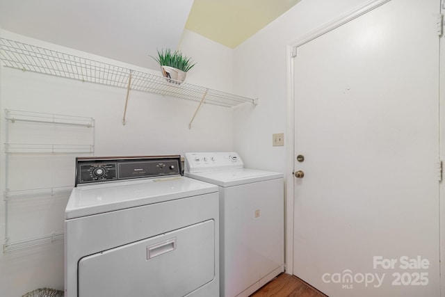 laundry room featuring laundry area and washing machine and dryer