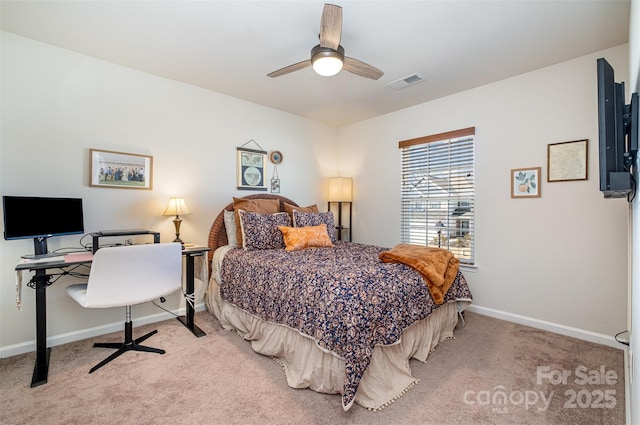 bedroom with ceiling fan, carpet, visible vents, and baseboards