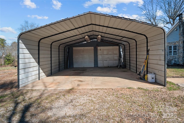 view of vehicle parking with a carport