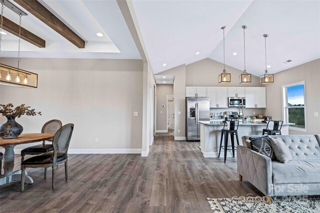 living area with dark wood-style flooring, recessed lighting, beam ceiling, and baseboards