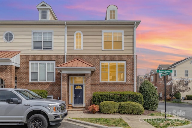 multi unit property with brick siding