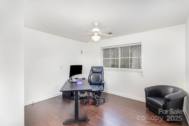 home office with baseboards, wood finished floors, and a ceiling fan