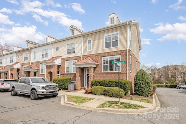 multi unit property with brick siding and central AC