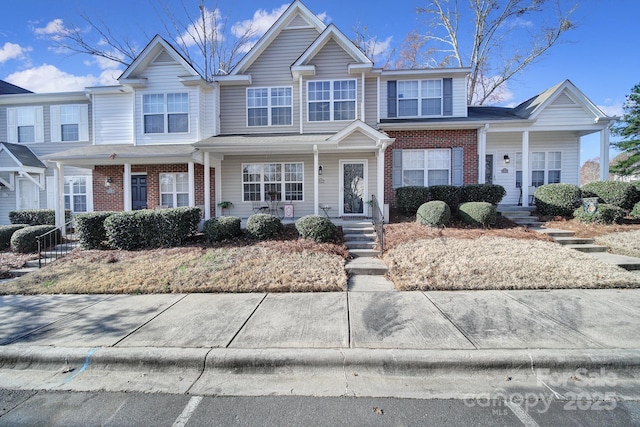 view of front of property with brick siding