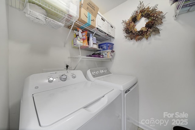 laundry area with washer and dryer and laundry area