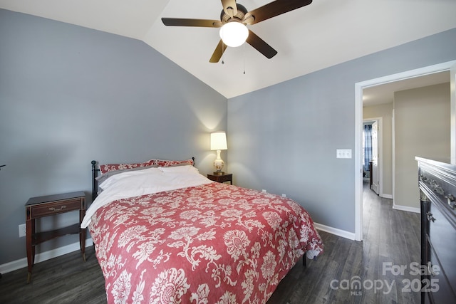 bedroom with baseboards, wood finished floors, a ceiling fan, and vaulted ceiling