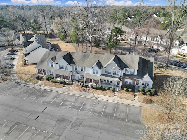 birds eye view of property with a residential view