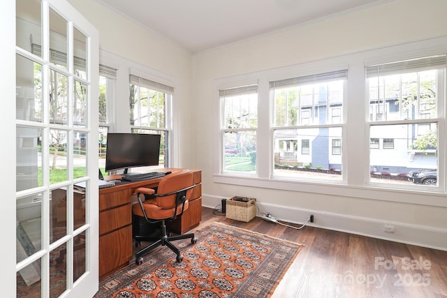 office featuring crown molding, baseboards, and wood finished floors