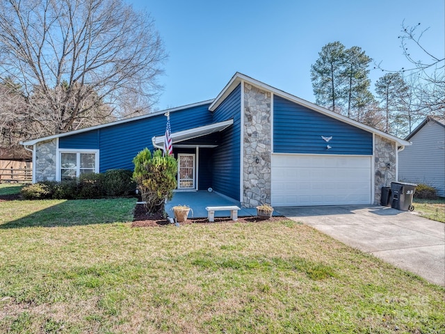 mid-century inspired home with a front lawn, a garage, stone siding, and concrete driveway