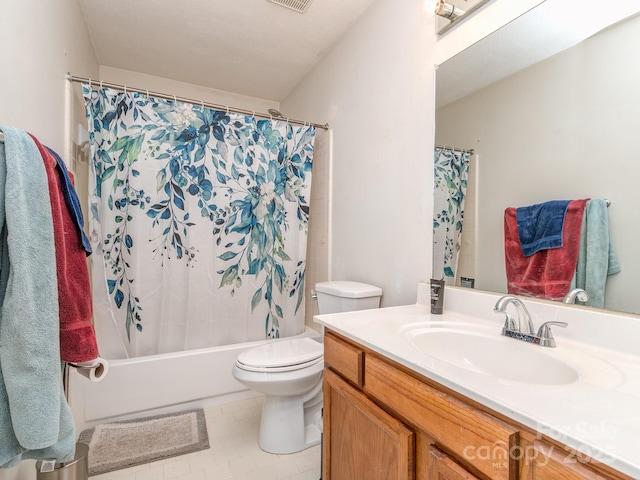 bathroom with vanity, toilet, and shower / tub combo