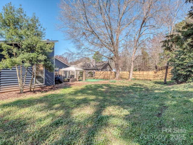 view of yard featuring fence