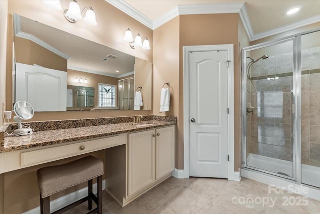 bathroom with ornamental molding, a shower stall, and tile patterned floors