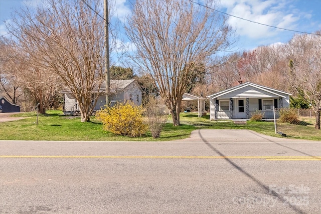 single story home with fence, a front lawn, and a porch