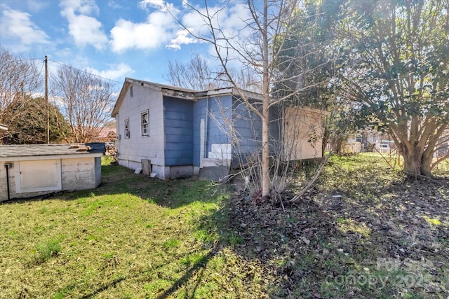 view of property exterior featuring a yard