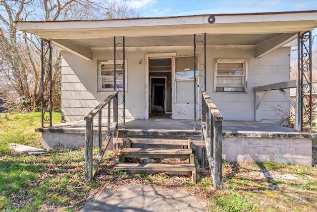 entrance to property with a porch