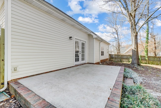 view of patio with fence and french doors