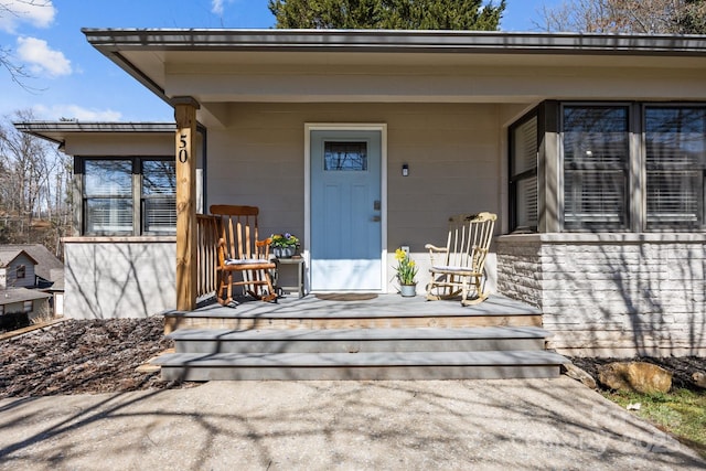 entrance to property with covered porch