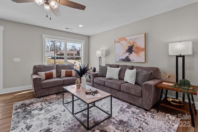 living area with visible vents, wood finished floors, recessed lighting, baseboards, and ceiling fan